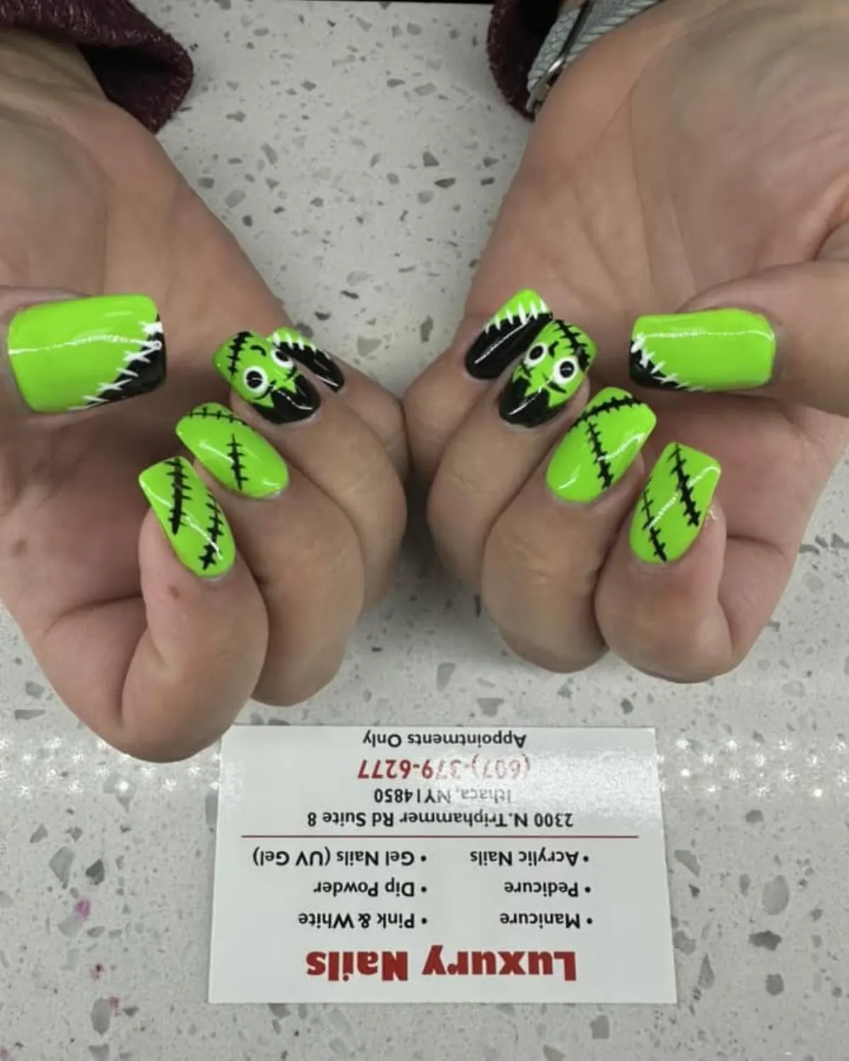 Neon green and black nail art